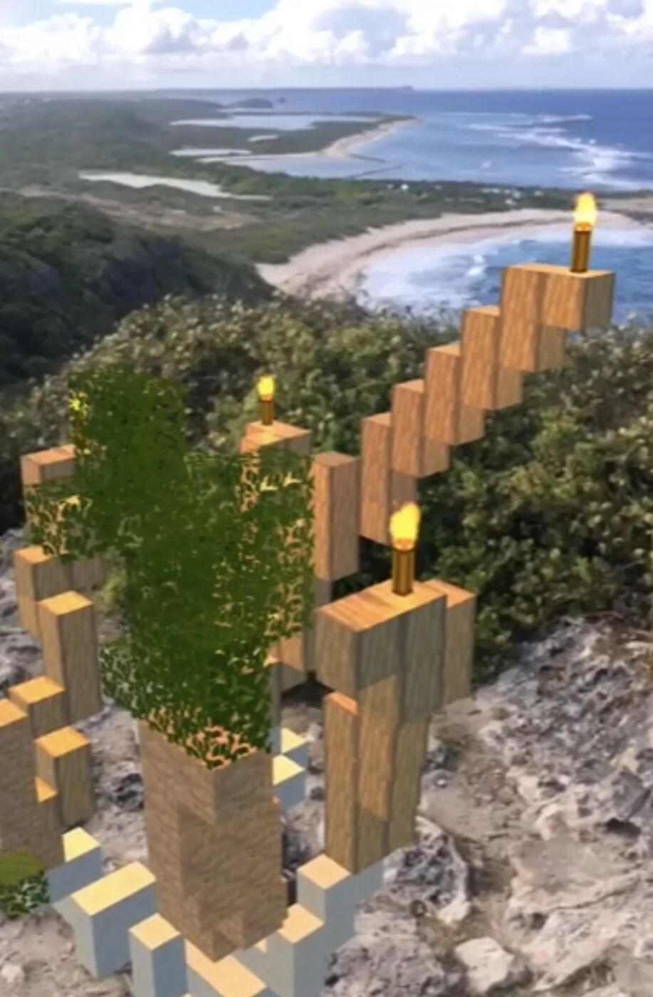 Block-built art seen through a phone at a real location