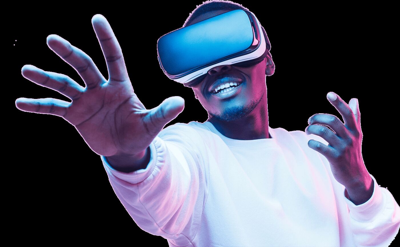 Person wearing a VR headset reaching out with both hands
